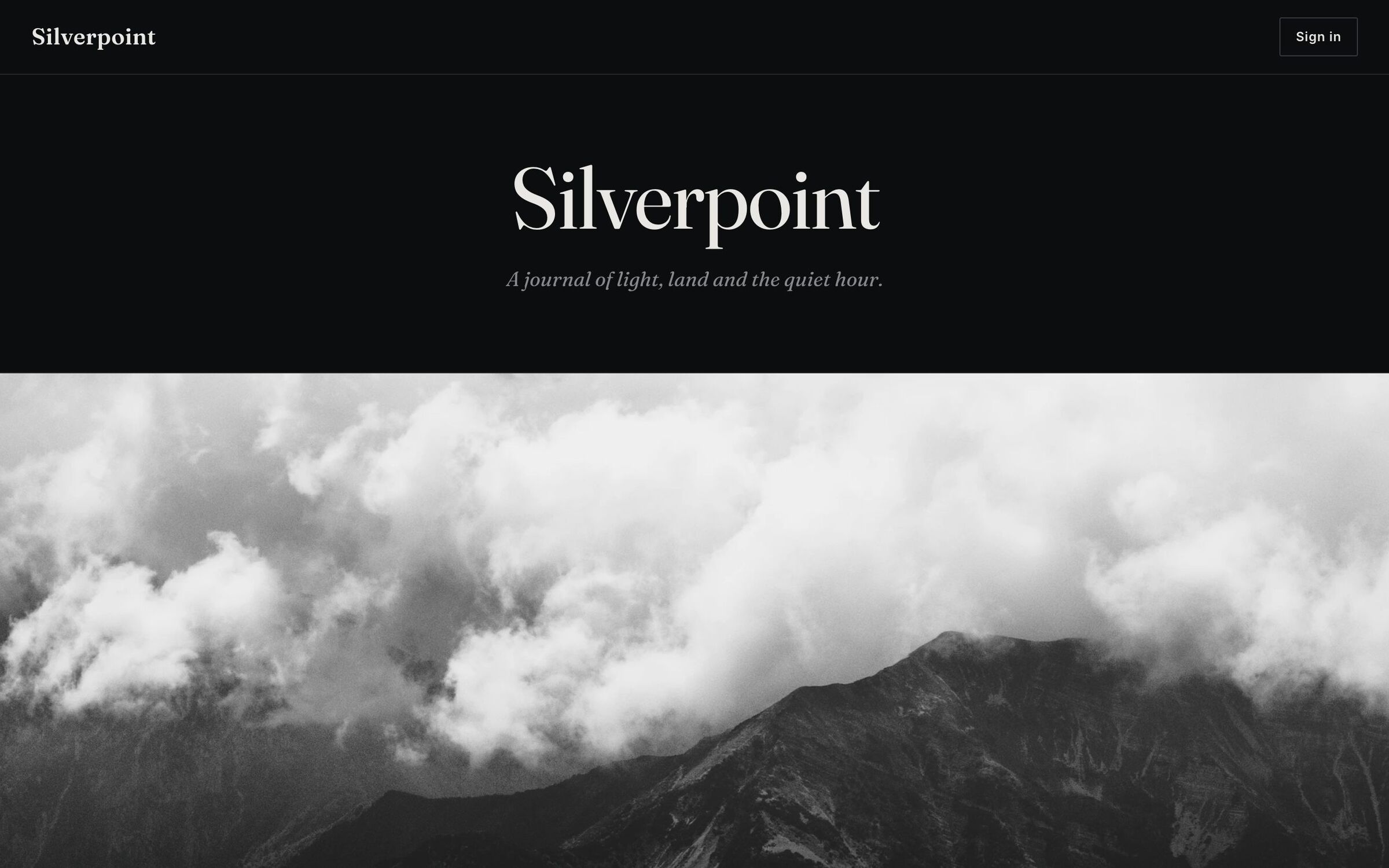Silverpoint theme — the dark gallery homepage with a full-bleed hero